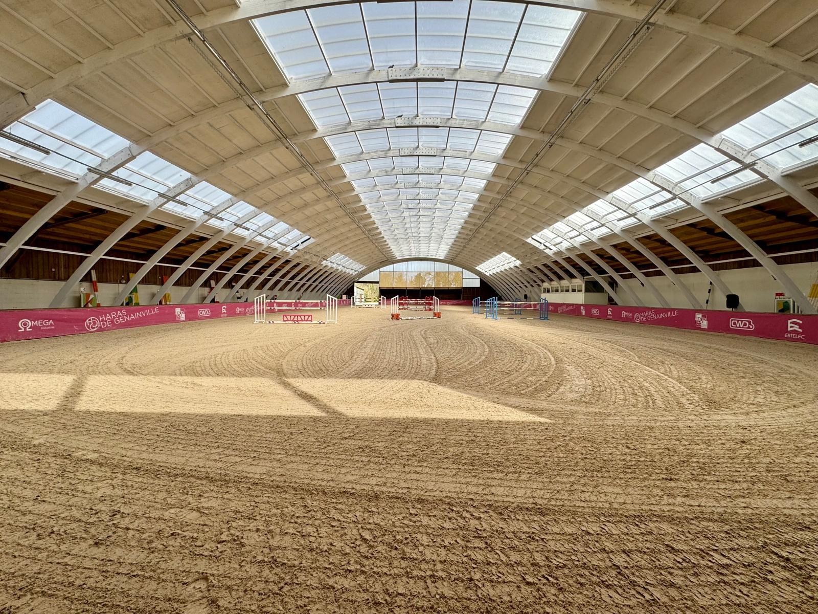Covered riding arena at Haras de Genainville